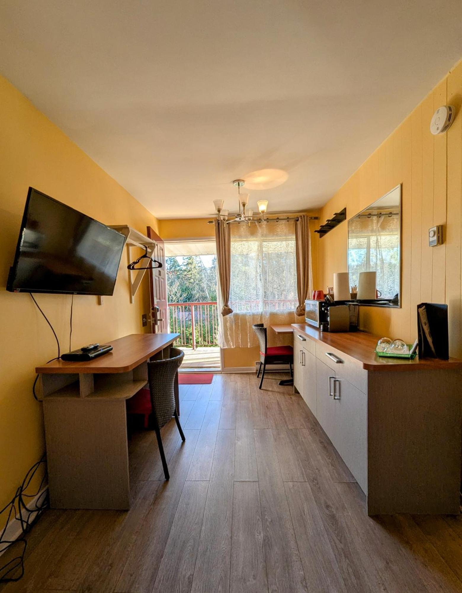Motel Des Pentes Et Suites Saint-Sauveur ภายนอก รูปภาพ